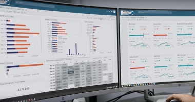 Rollmaster analytics screenshot on dual desktop screens